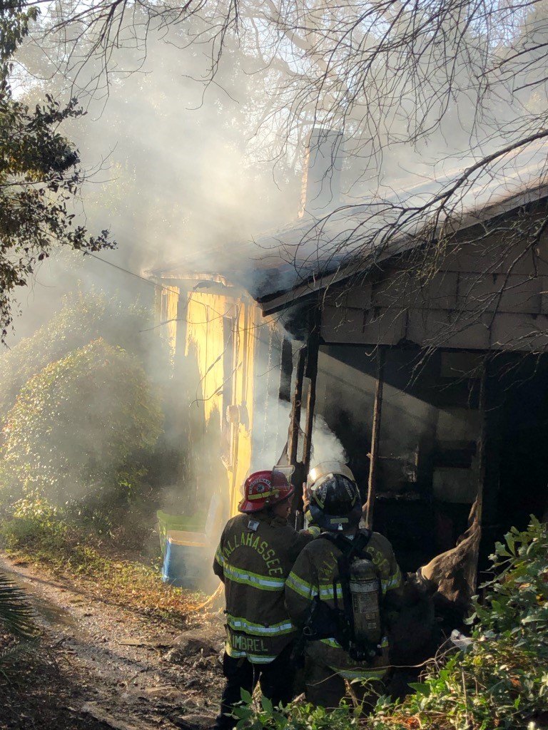 Firefighters responding to a structure fire