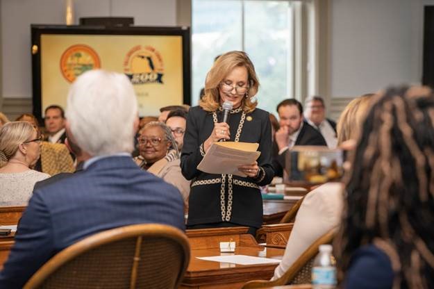 Representative Allison Tant reads from a proclamation. Photo by Meredith Geddings and Sarah Gray of Florida House Photography